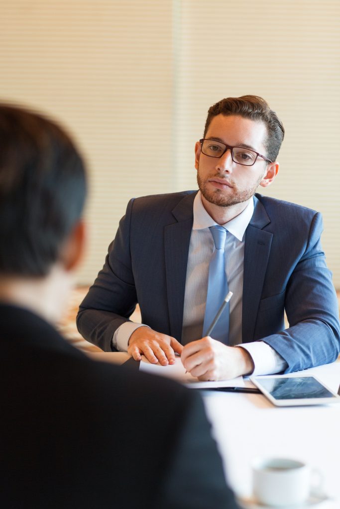 Person is interviewing applicant